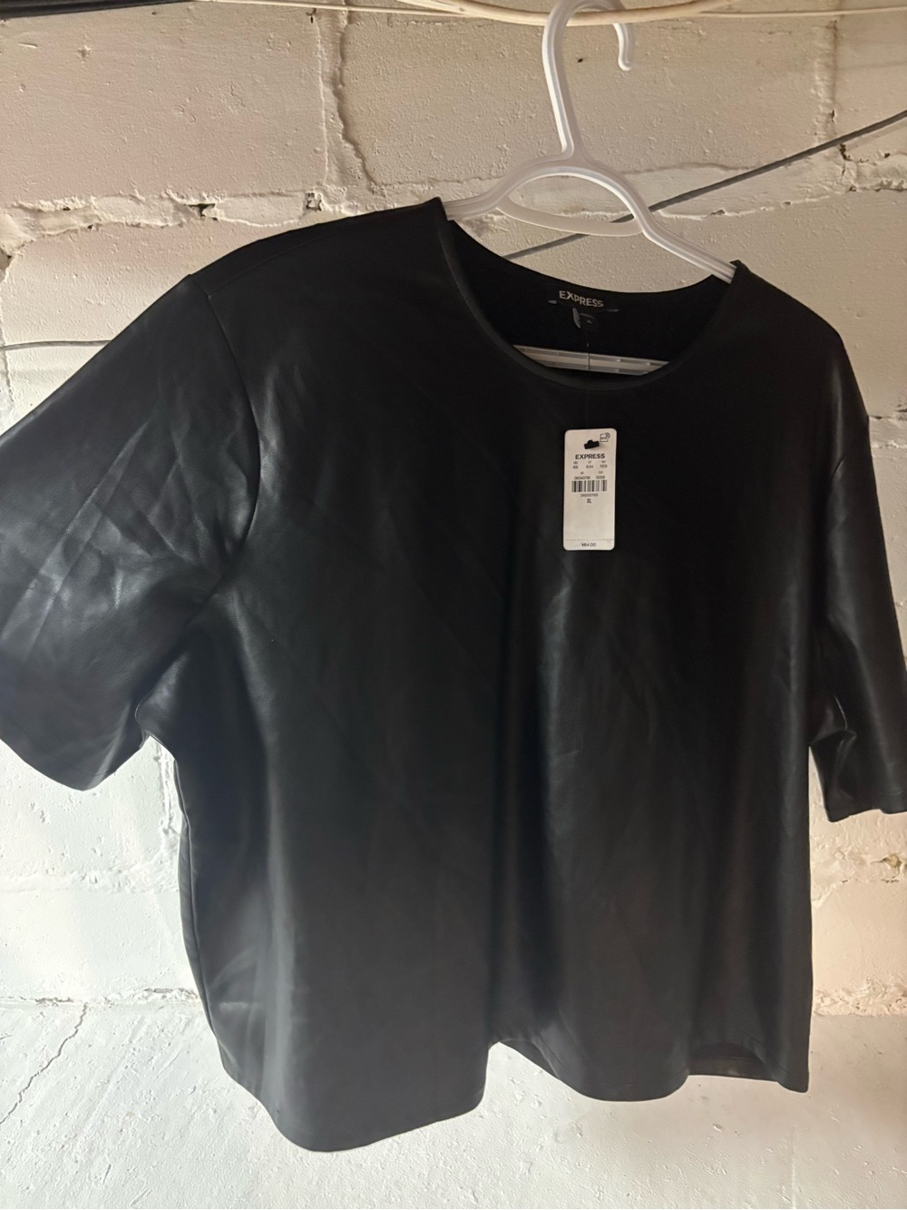 Black faux leather top by Express